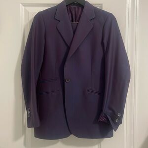 Size 10/12 suit. Beautiful sheen that makes the suit appear a dark purple/blue.